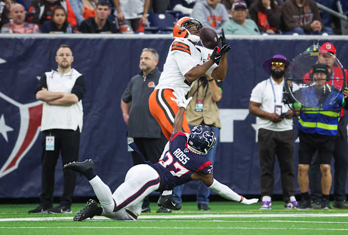 Browns wide receiver Amari Cooper makes a reception and scores a touchdown as Houston Texans cornerback D'Angelo Ross defends during the second quarter at NRG Stadium.
